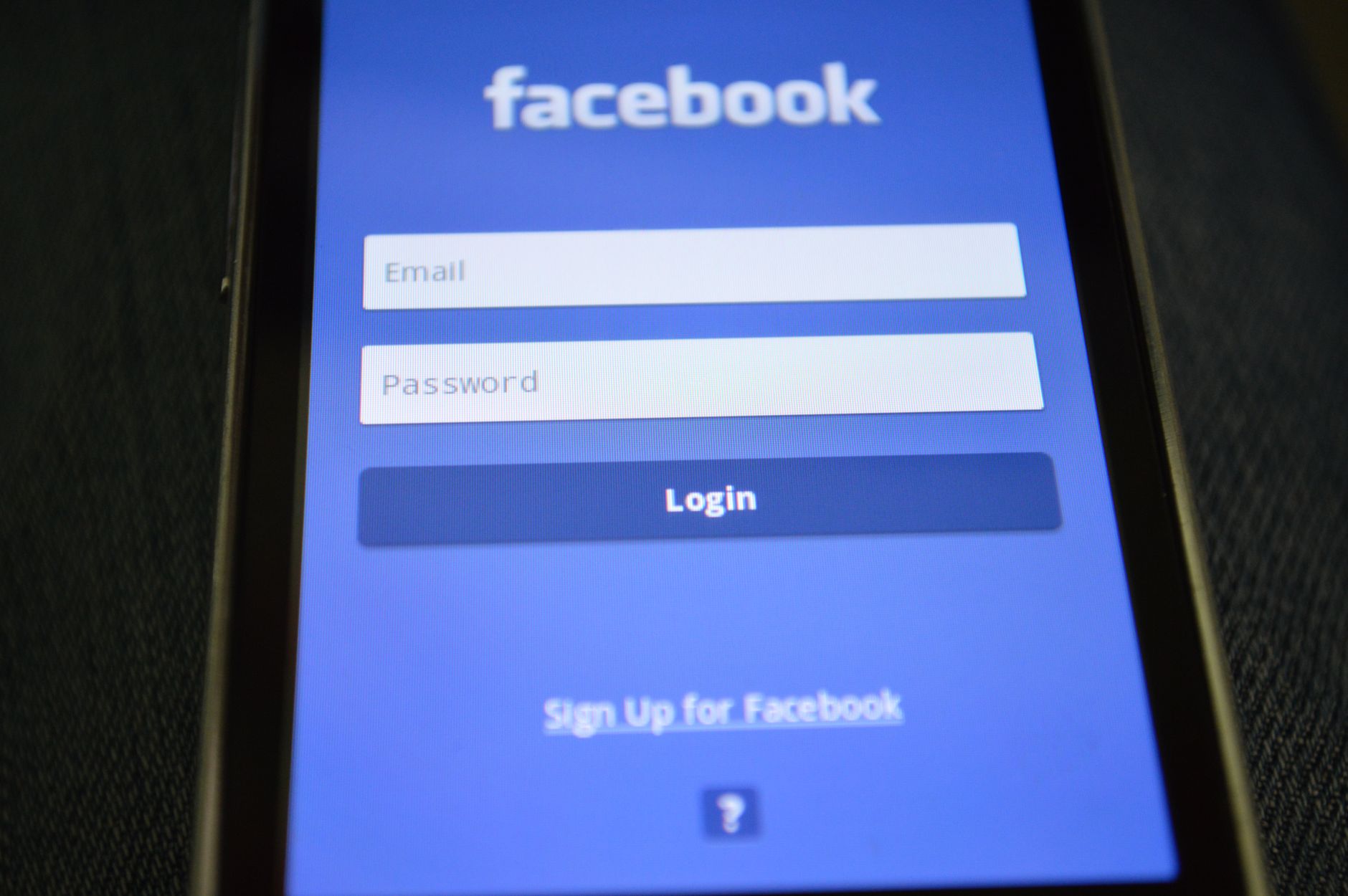 Person looking at a login approval notification on a smartphone