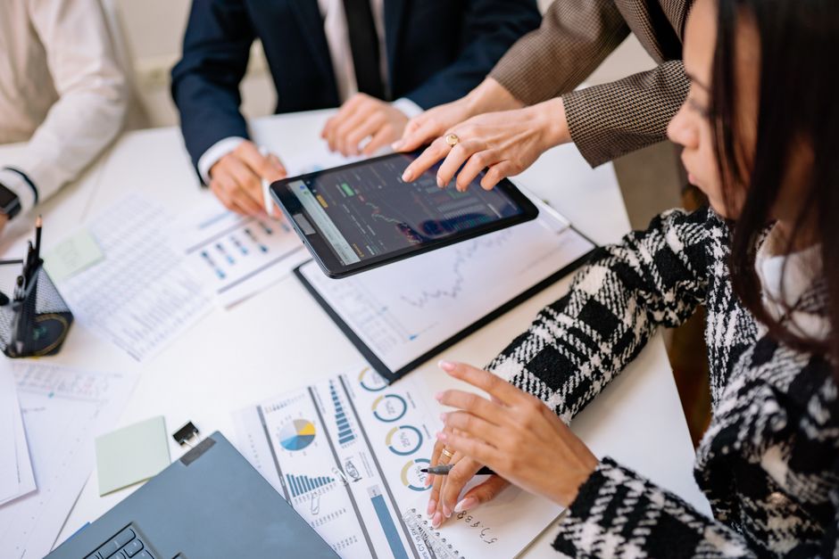 Financial services professionals reviewing digital operational resilience requirements in a meeting