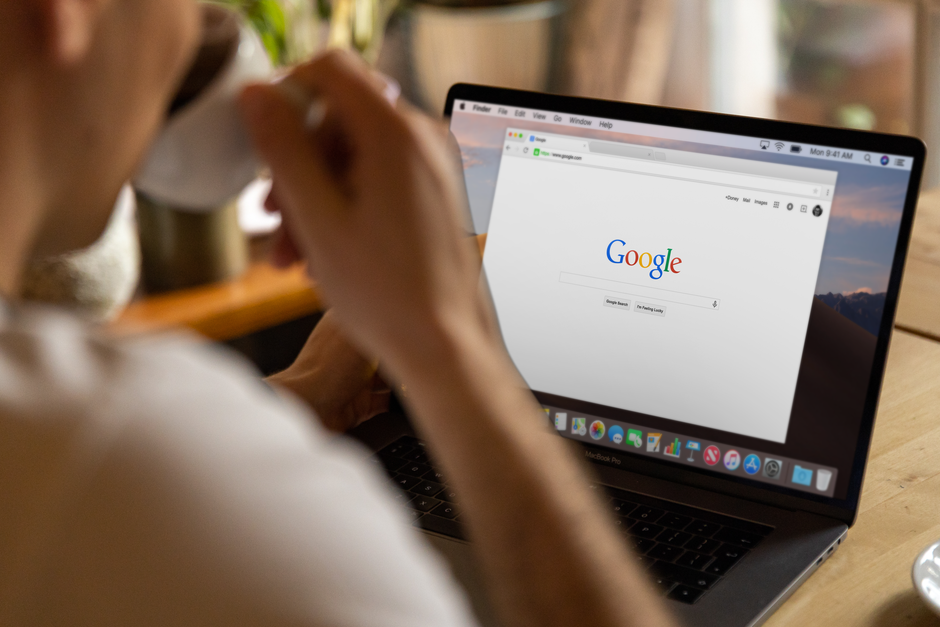 A web browser open on a laptop screen in a workplace setting