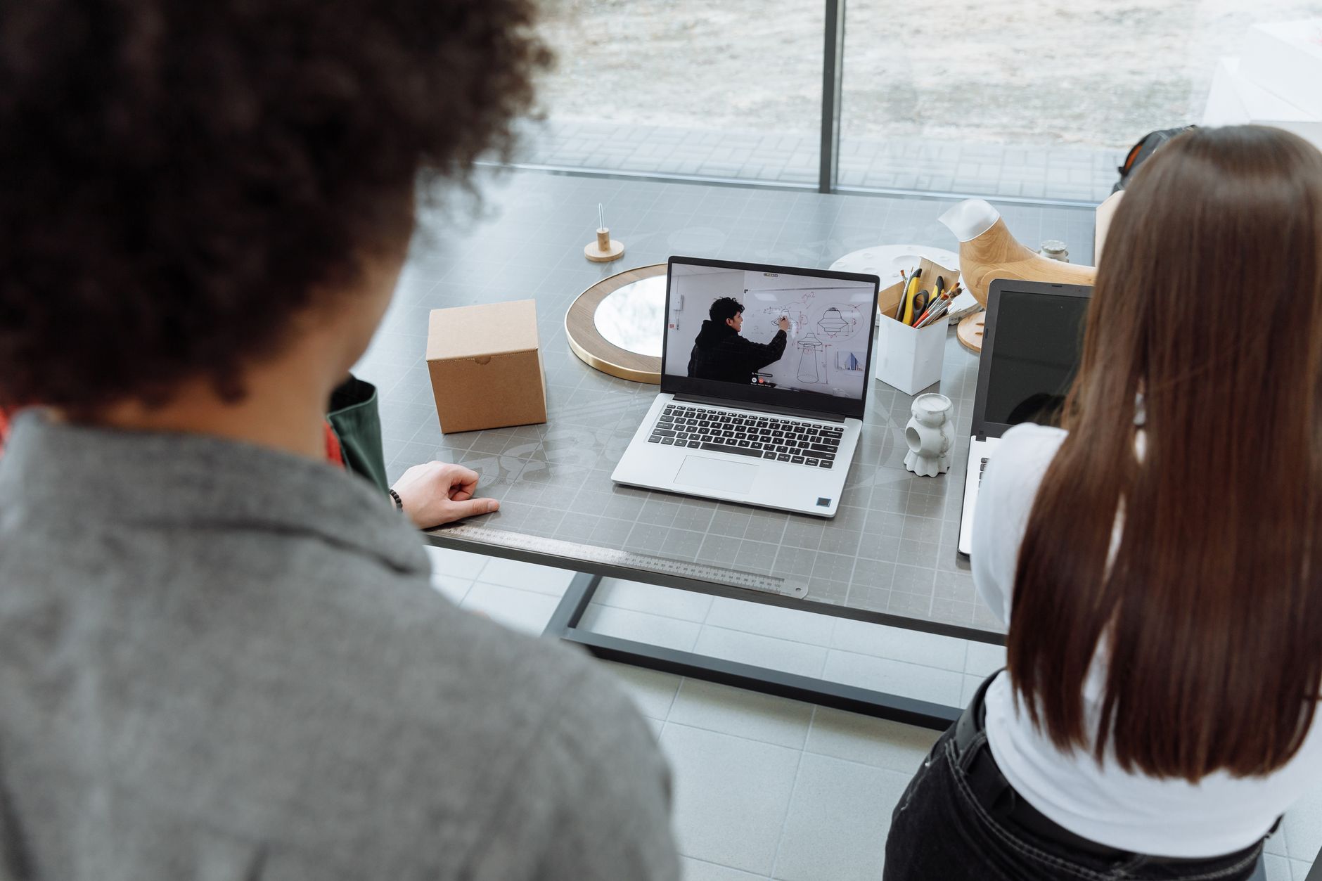 Employee reviewing personal training progress on a laptop
