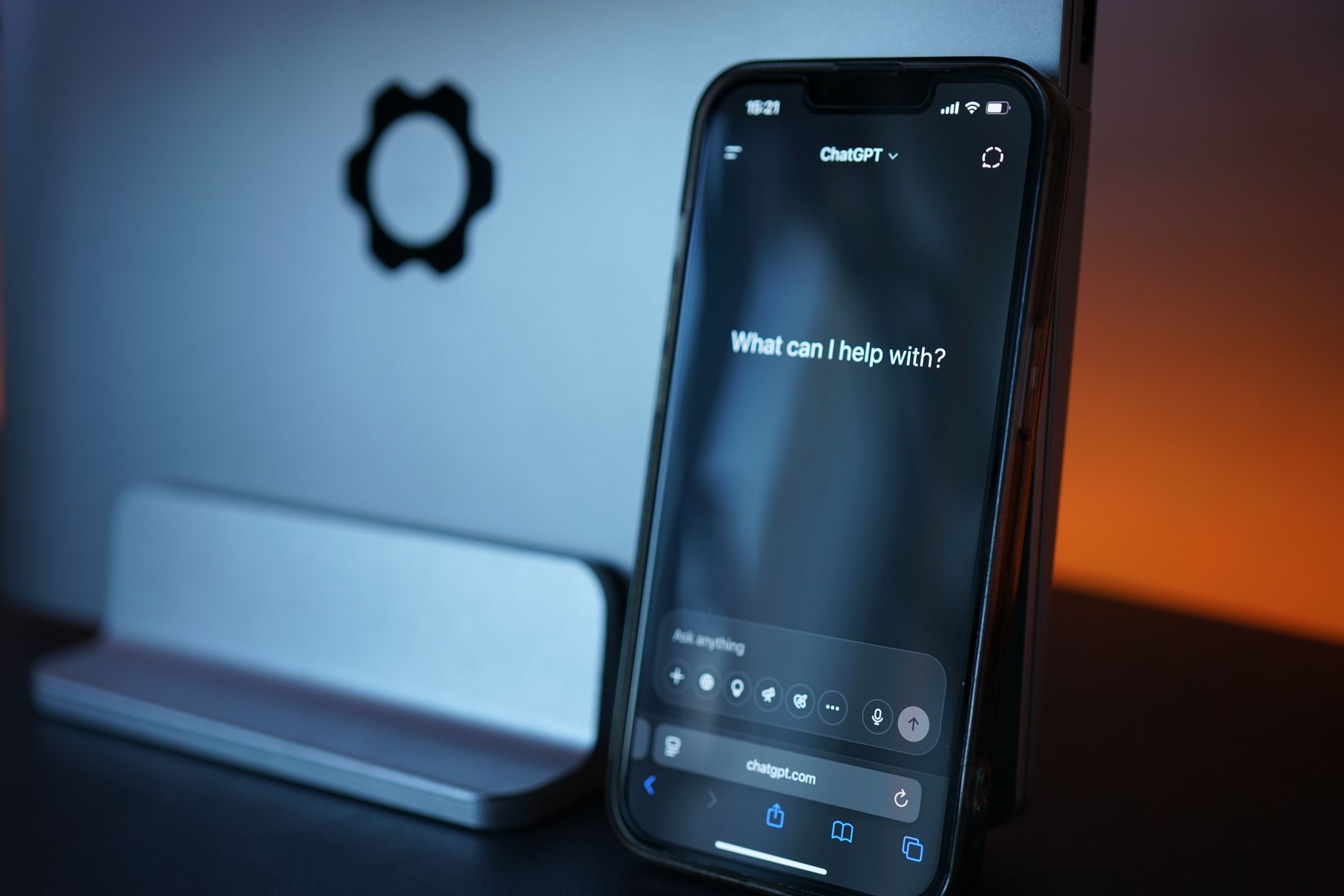 Employee using an AI chatbot assistant on a laptop in an office