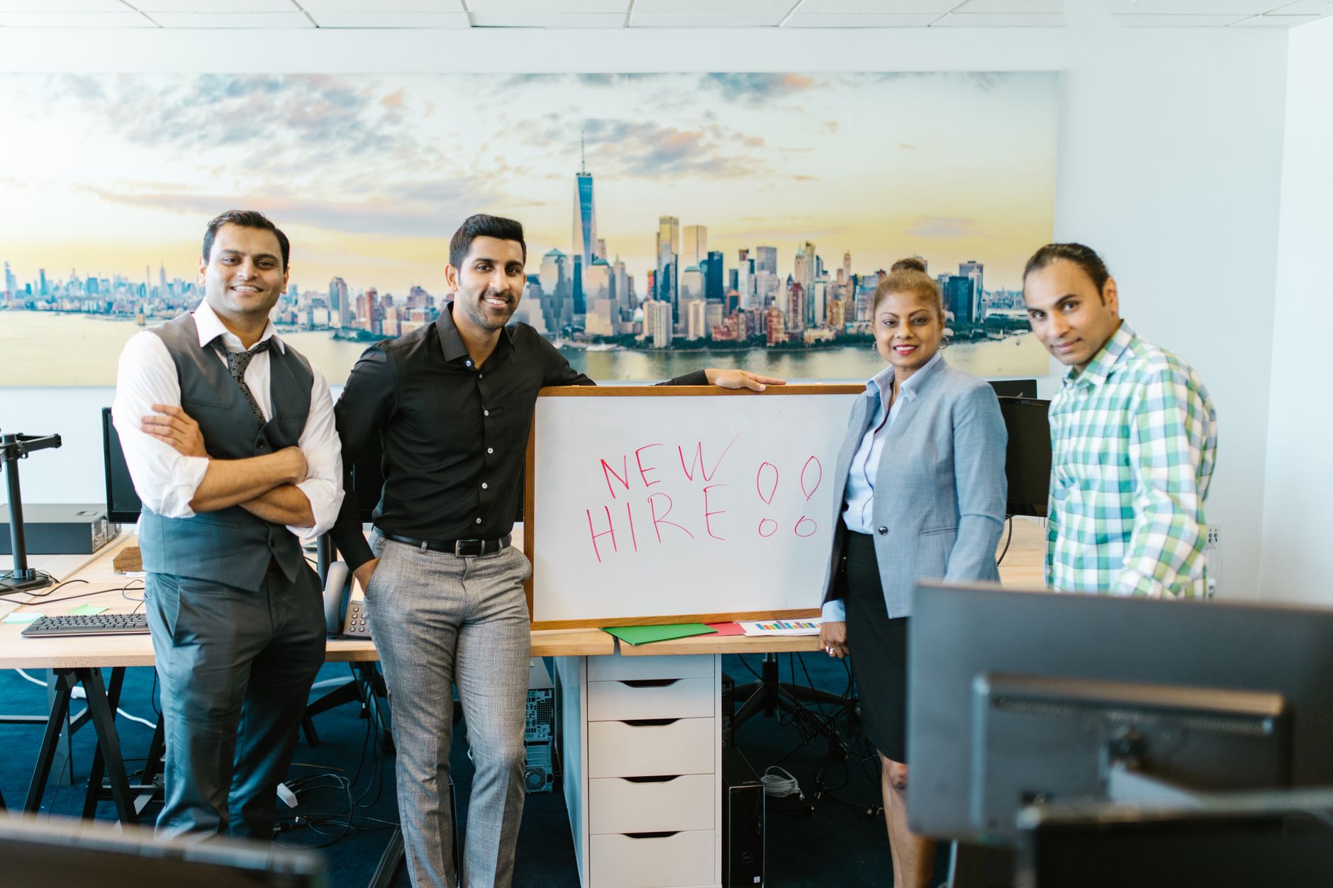 Group of new employees arriving at the office together at the start of September