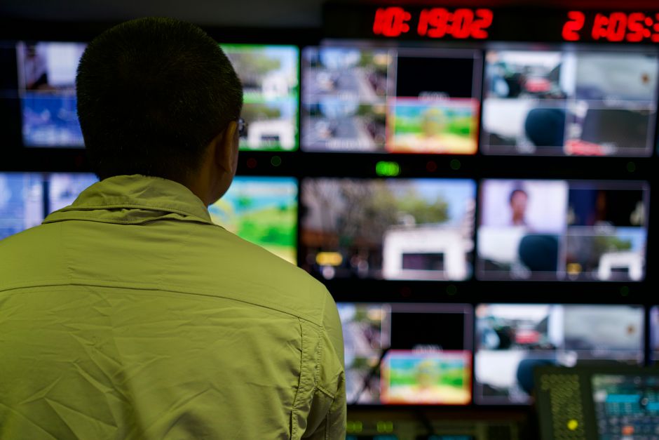 Security analysts monitoring threat dashboards in an operations center